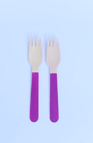 purple painted forks