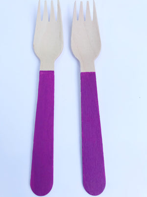 purple wooden forks
