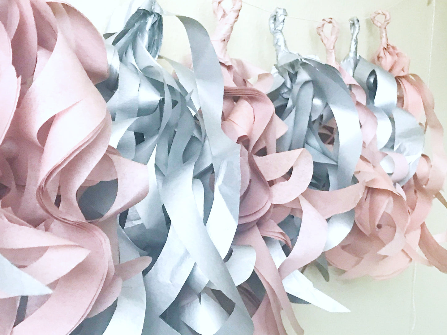 rose gold and metallic silver tissue tassel garland