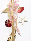 Ariel little mermaid seashell wand in pink and red