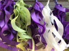 curly tassel garland in white purple and sage