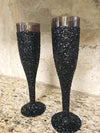 Black glitter toasting champagne flutes