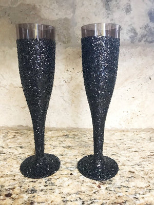 Plastic Black Glitter champagne flutes