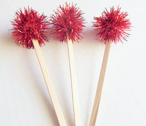 Red tinsel topper drink stirrers