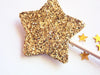 Gold star wooden fairy wand in gold glitter