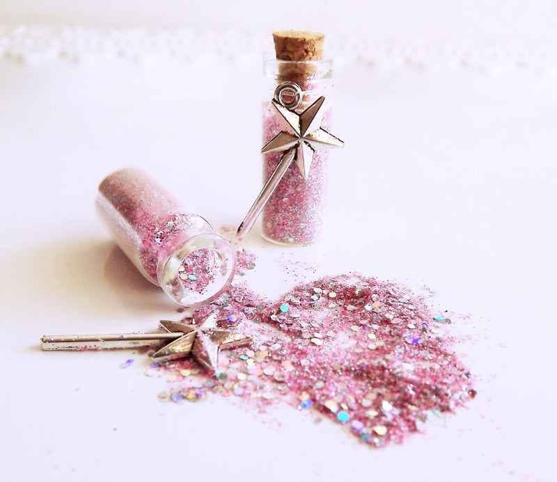pink glitter fairy dust party favors with white bag