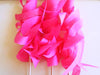 pink tissue paper curly ribbon wands