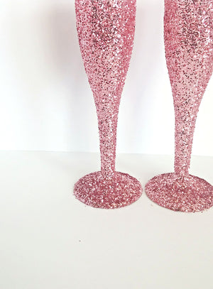 light pink glitter champagne flutes in a set of 12