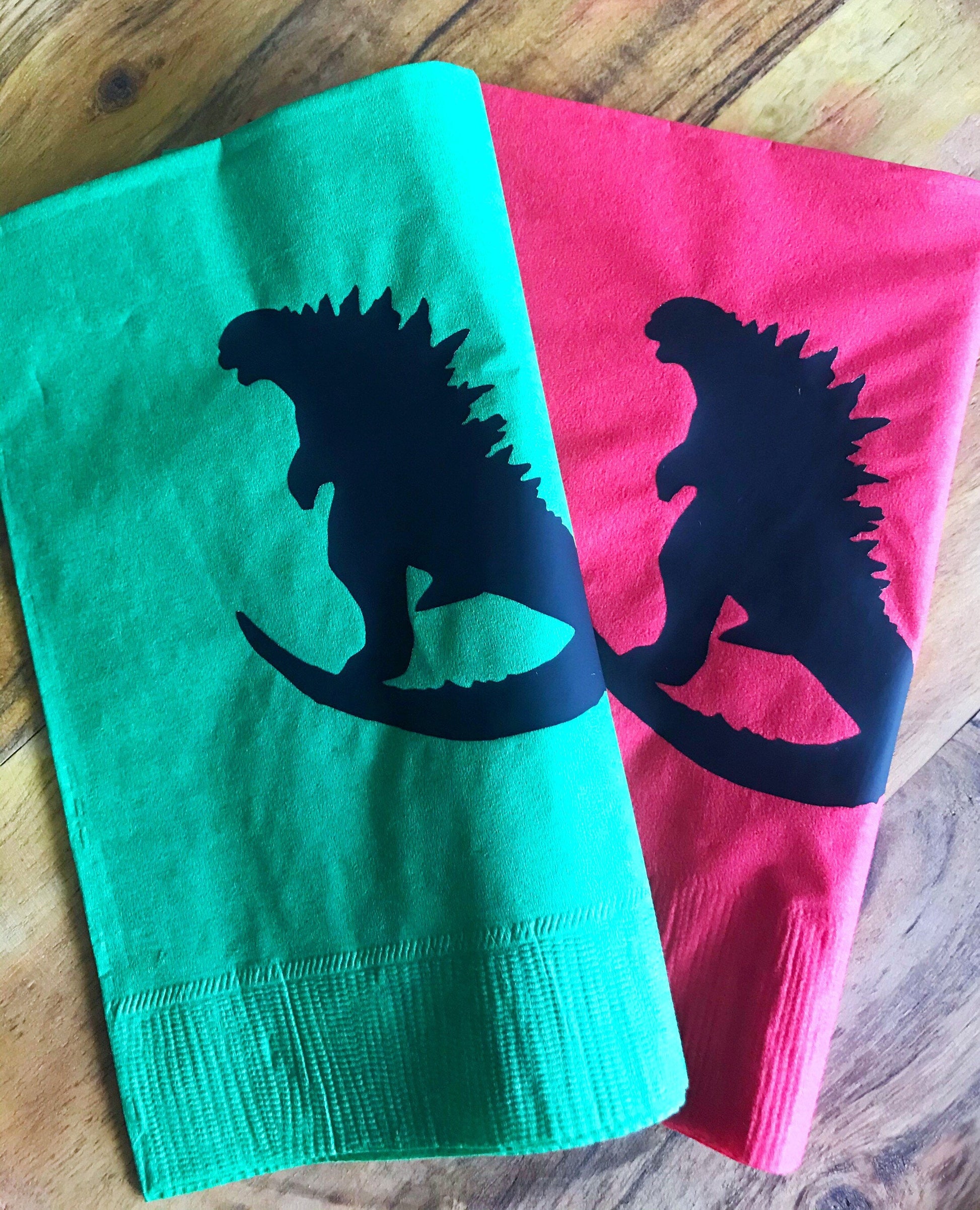 green and red godzilla napkins