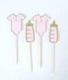 Pink baby bottle and onsie cupcake topper picks