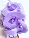 Lavender curly tissue toss made from 100% recycled fibers