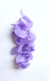 Purple curly tissue toss