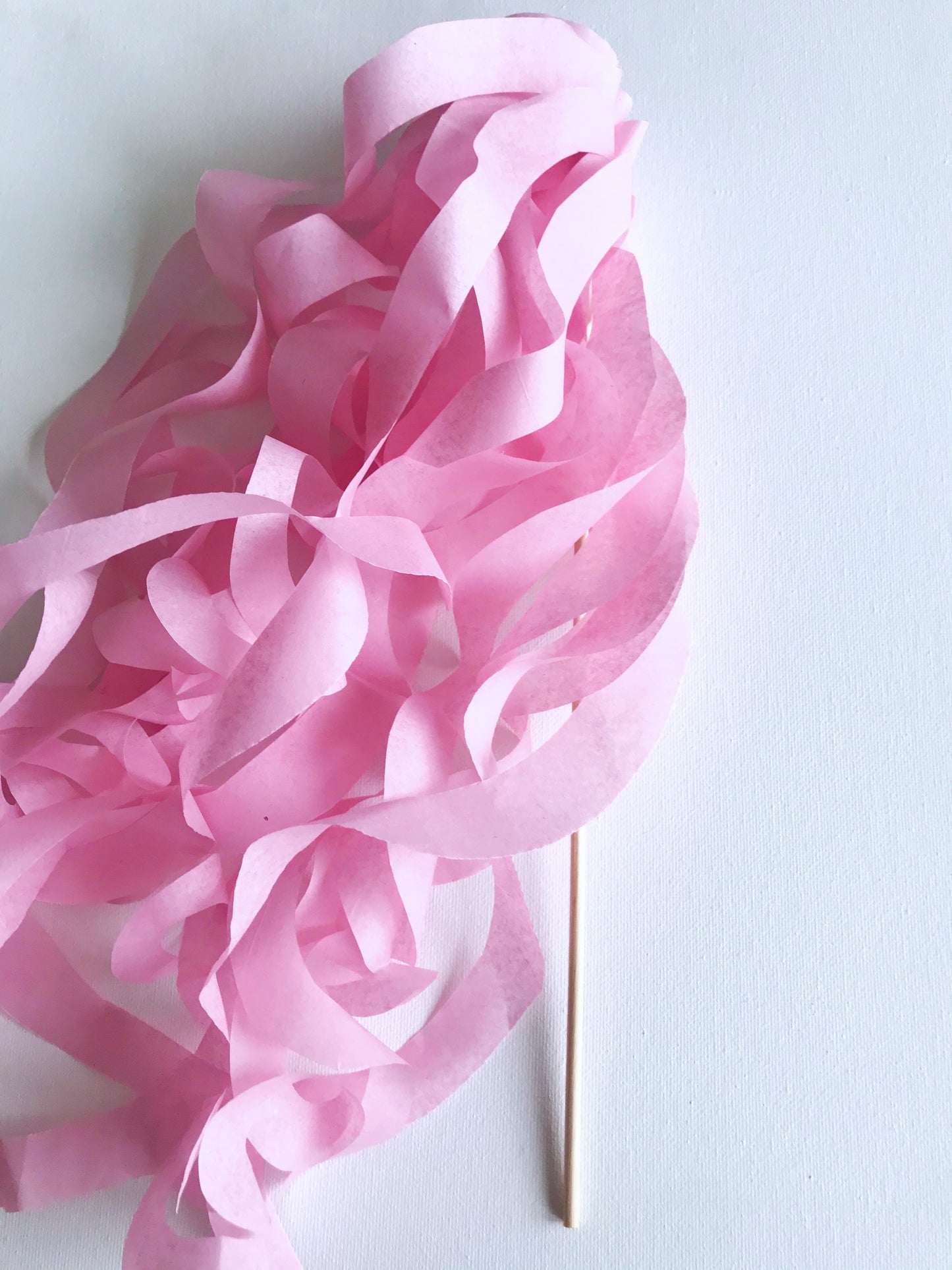 light pink paper wand streamers