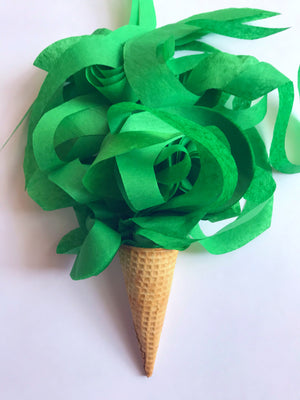 Green curly tissue paper toss for packaging
